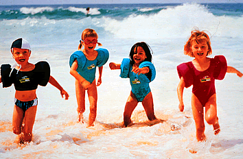Pictured here kids having fun in the surf @ Bondi Beach, Australia.